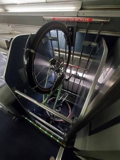 Bicycle secured in an Amtrak onboard bicycle rack